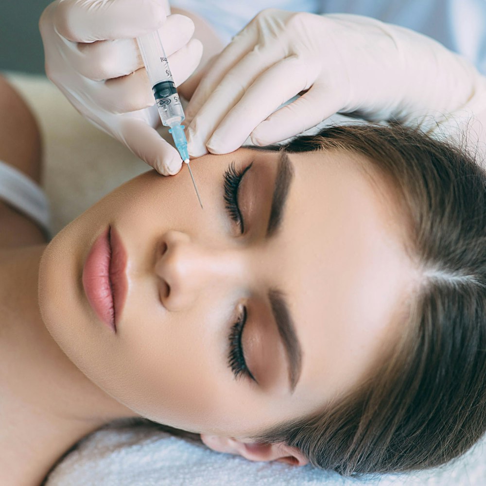 woman getting fillers injections