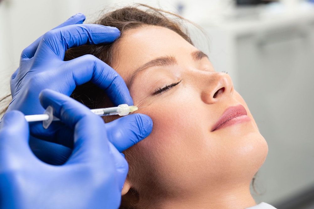woman getting botox maintenance session