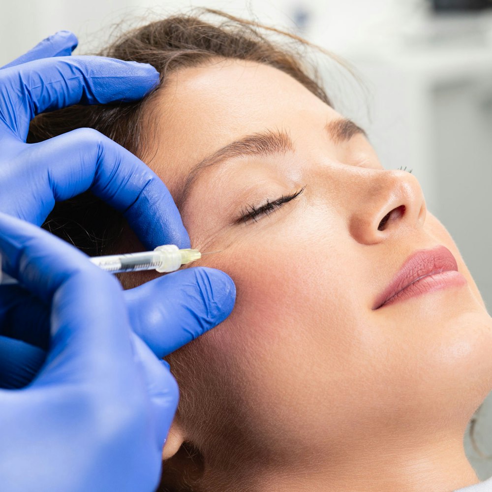 woman getting botox maintenance session