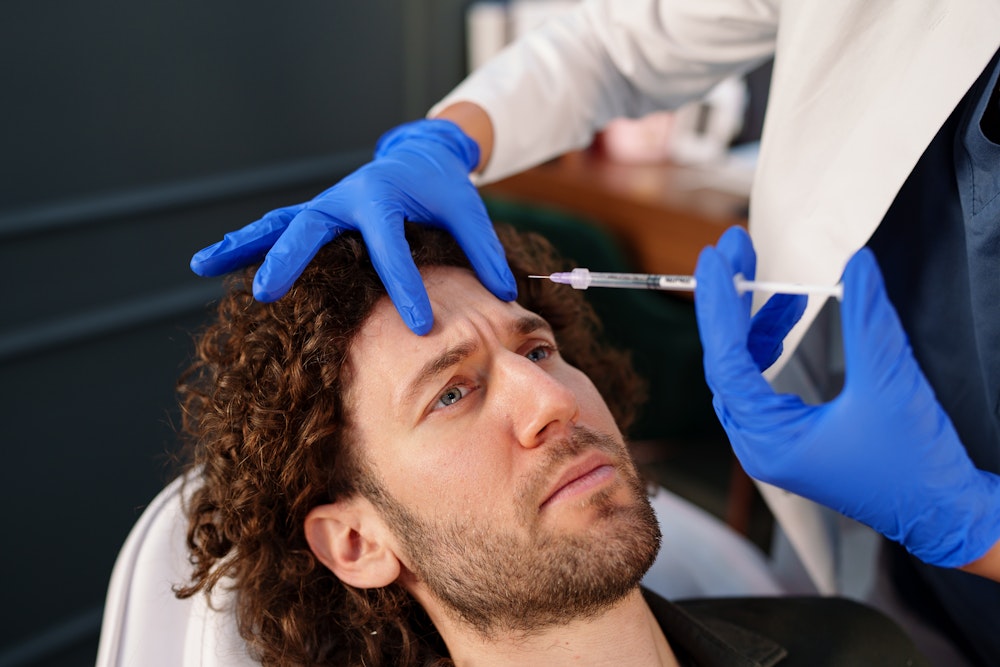 Man receiving BOTOX® Cosmetic