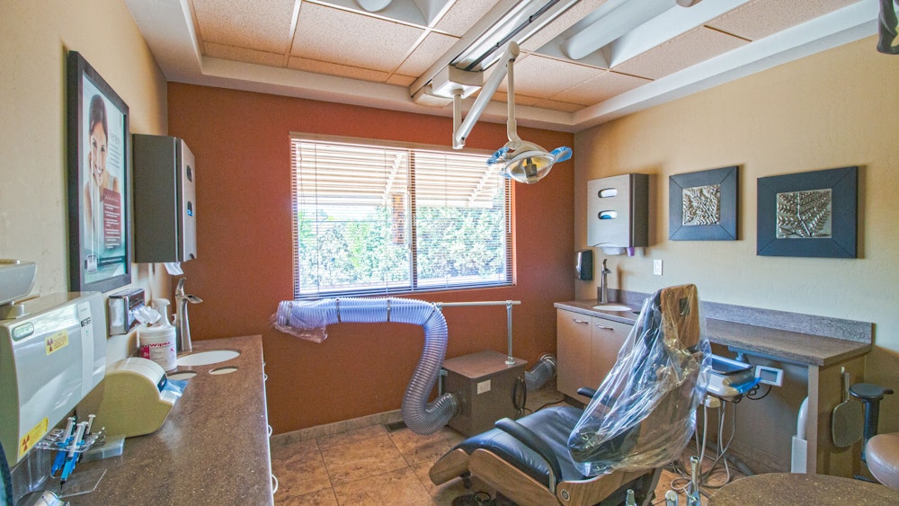 Interior shot of office with dental chair and window