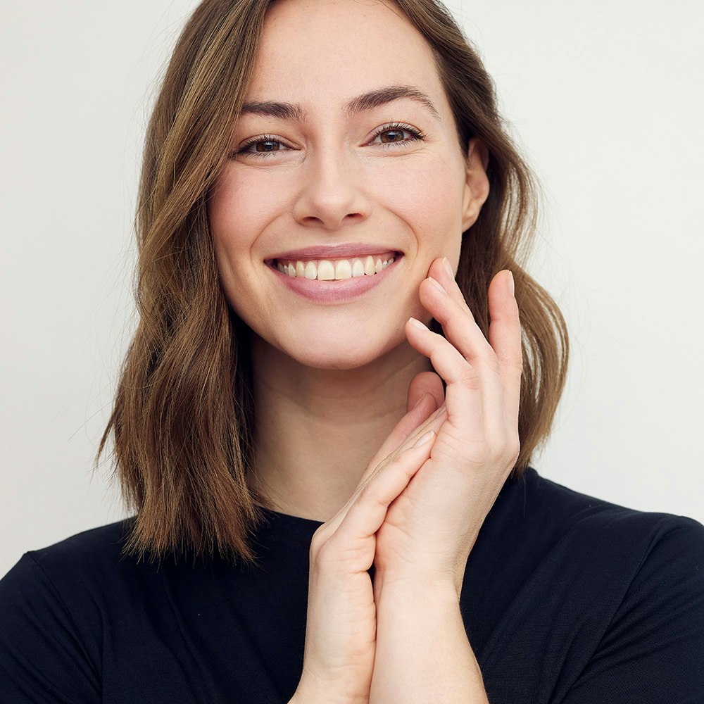 Young, beautiful woman smiling