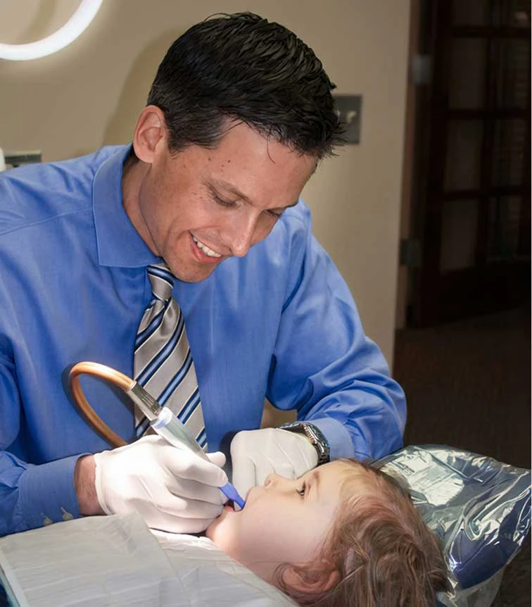 dentist treating child