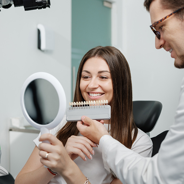 woman smiling in mirror