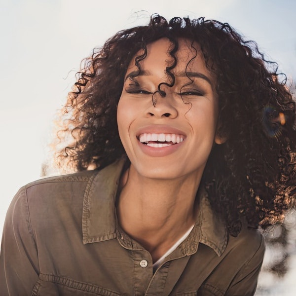 Beautiful woman smiling with a perfect smile