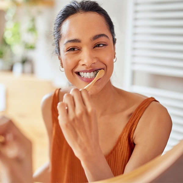 Woman brushing her teeth