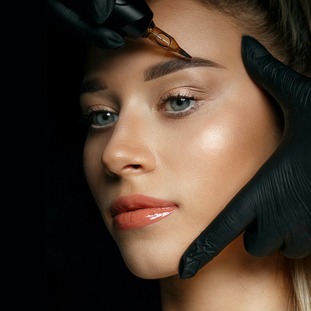 woman getting permanent makeup