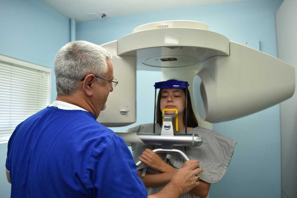 Dr. Lande with a patient