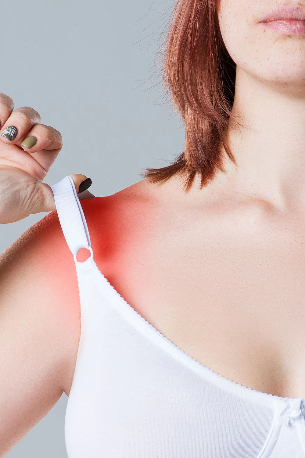 woman with shoulder pain due to bra