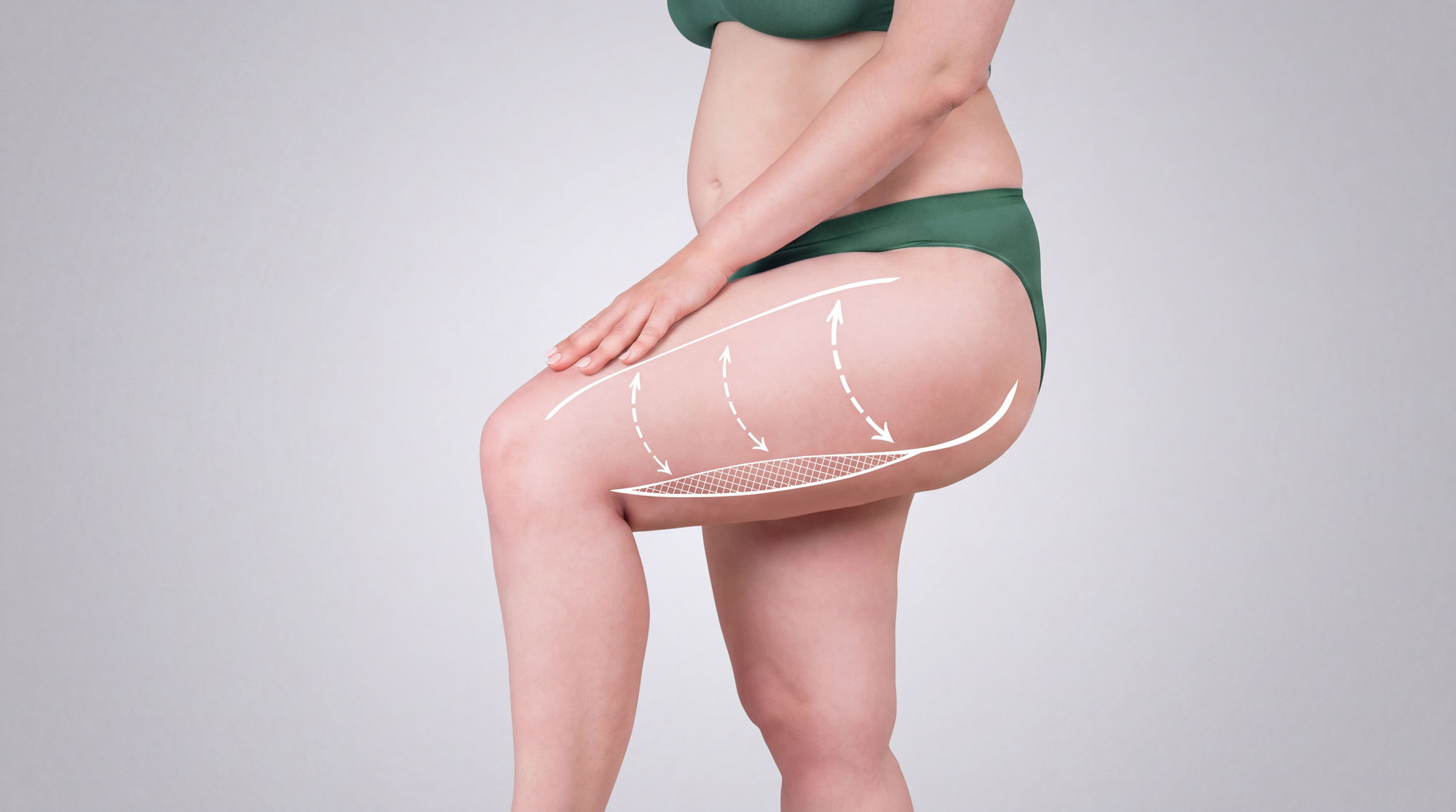 Woman standing with leg lifted