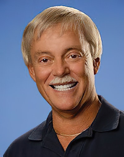 smiling man with great teeth and a blond mustache