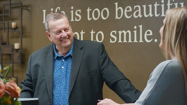 Dr. Heringer speaking to patient in lobby