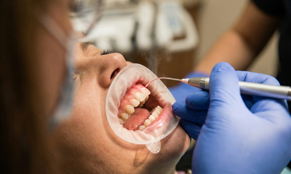 patient geting laser gum treatment