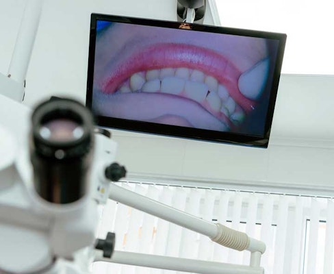 Photo of teeth on television