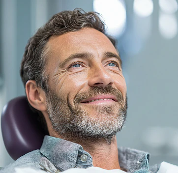 Smiling man in the exam chair