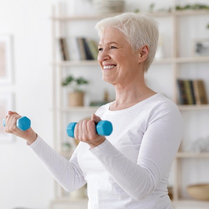Mature woman doing curls