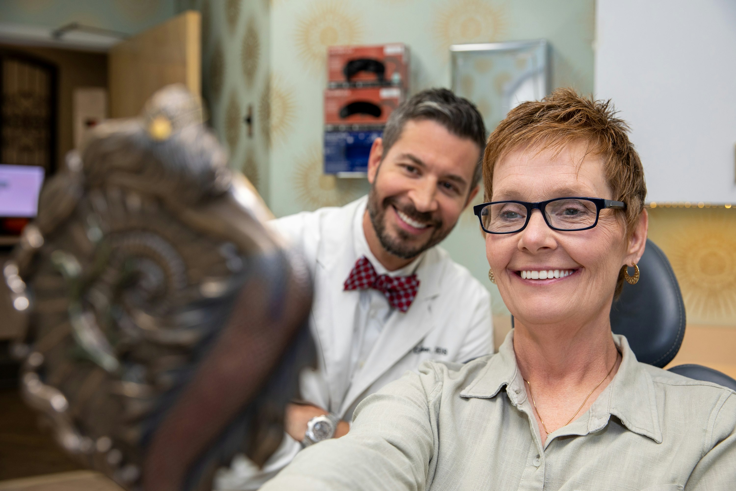 Southern Implant Dental dentist with patient