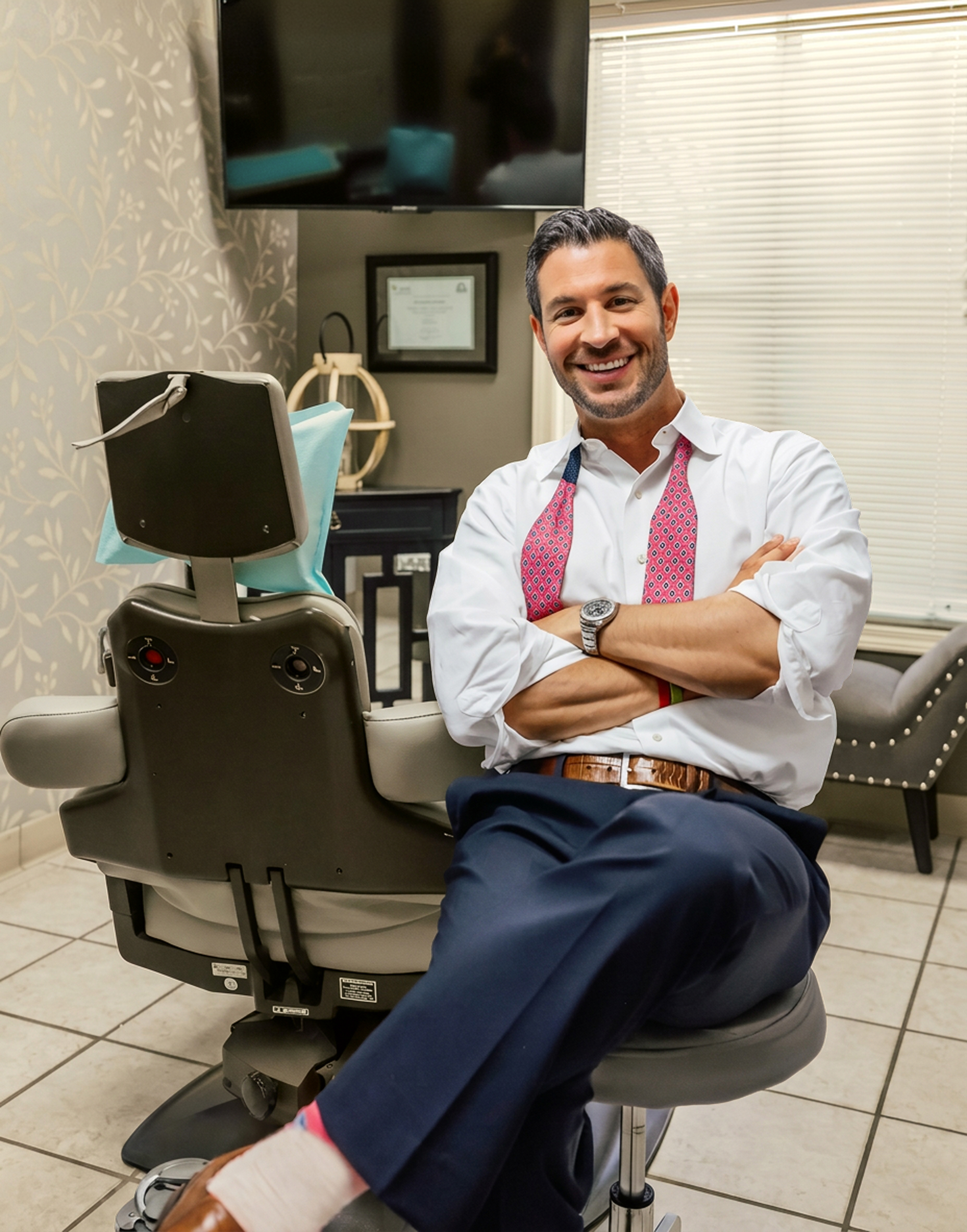 Dr. Collier in exam room smiling
