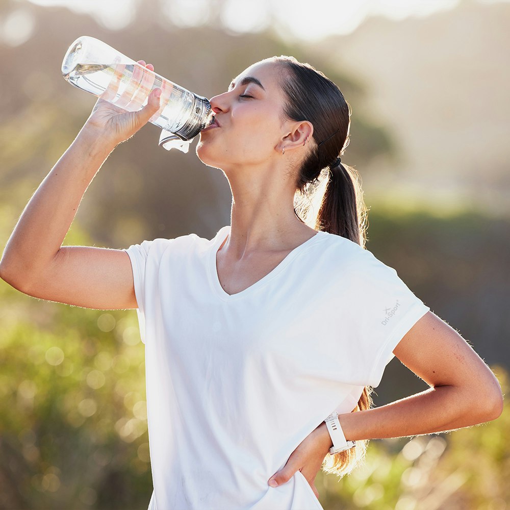 a woman drinking water