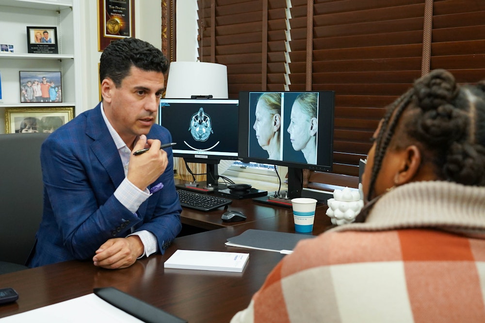 Dr. Lerman consulting with a patient