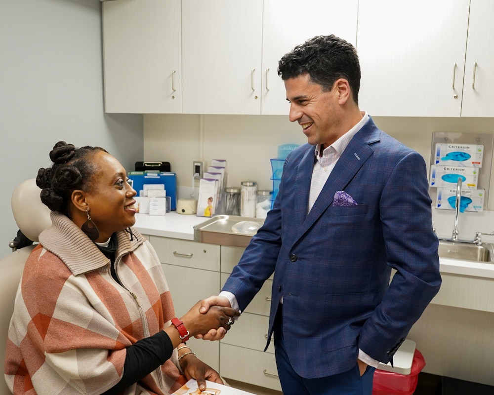 Dr. Lerman greeting a patient