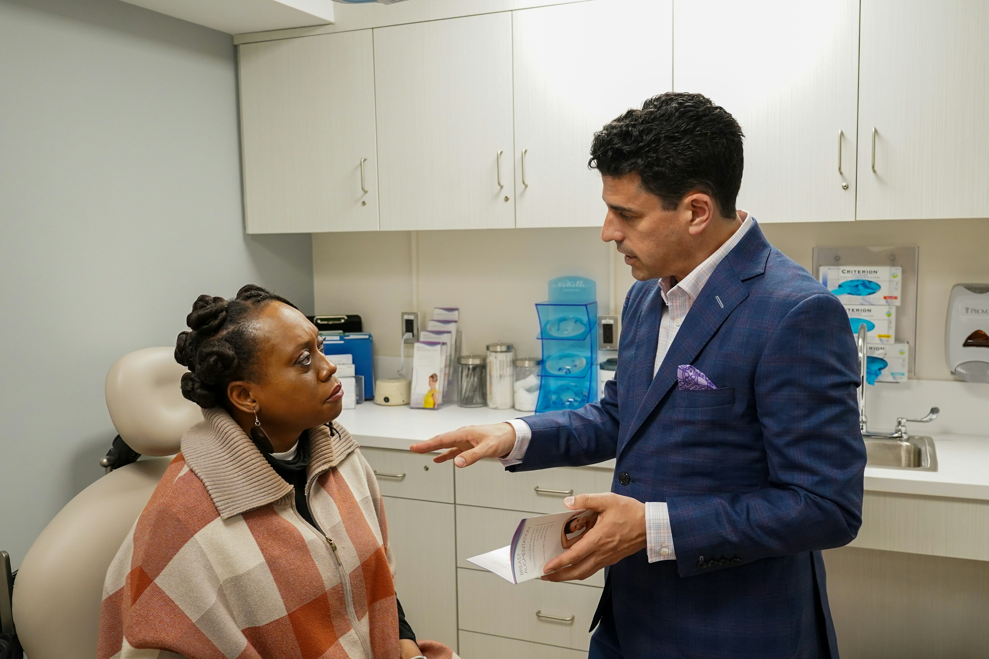 Dr. Lerman talking to patient about breast implants