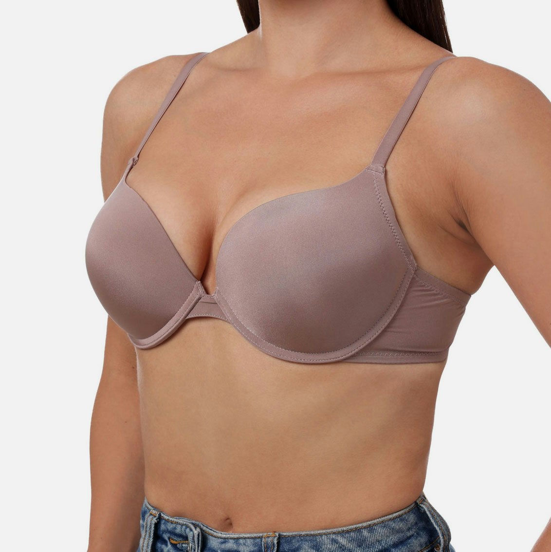 Woman's chest in tan bra