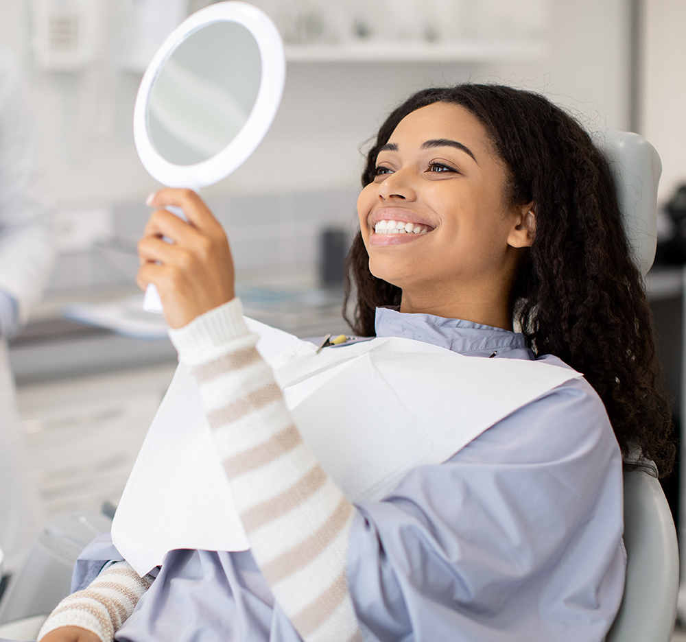 Woman smiling in mirror