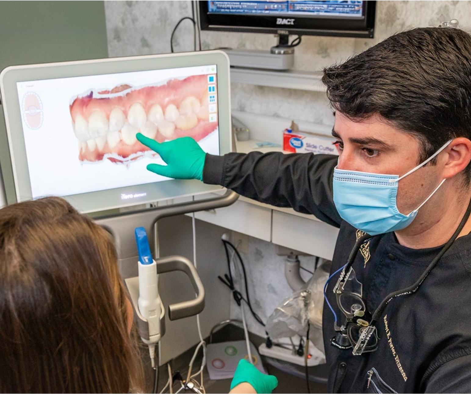 Dr. Robert Porter with client showcasing digital mockup