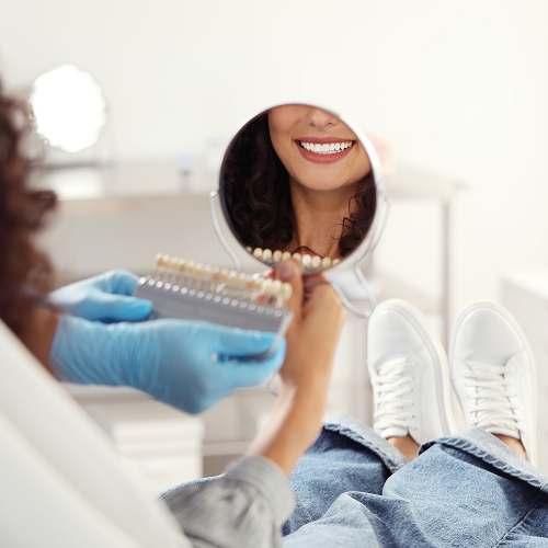 woman smiling in mirror
