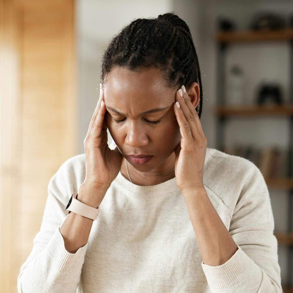 Mature woman with headache