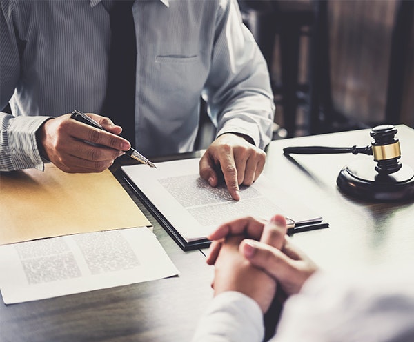 man reviewing paperwork
