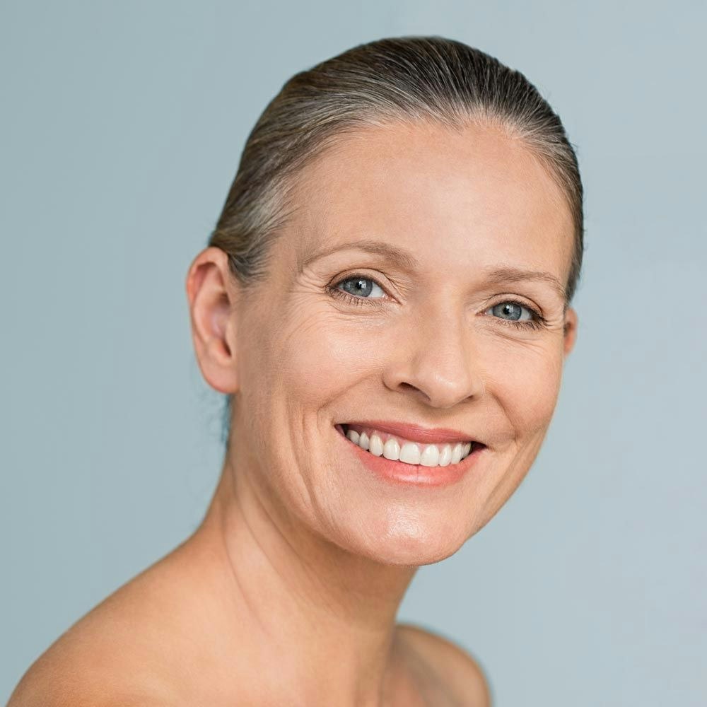 Smiling mature woman after spa treatment