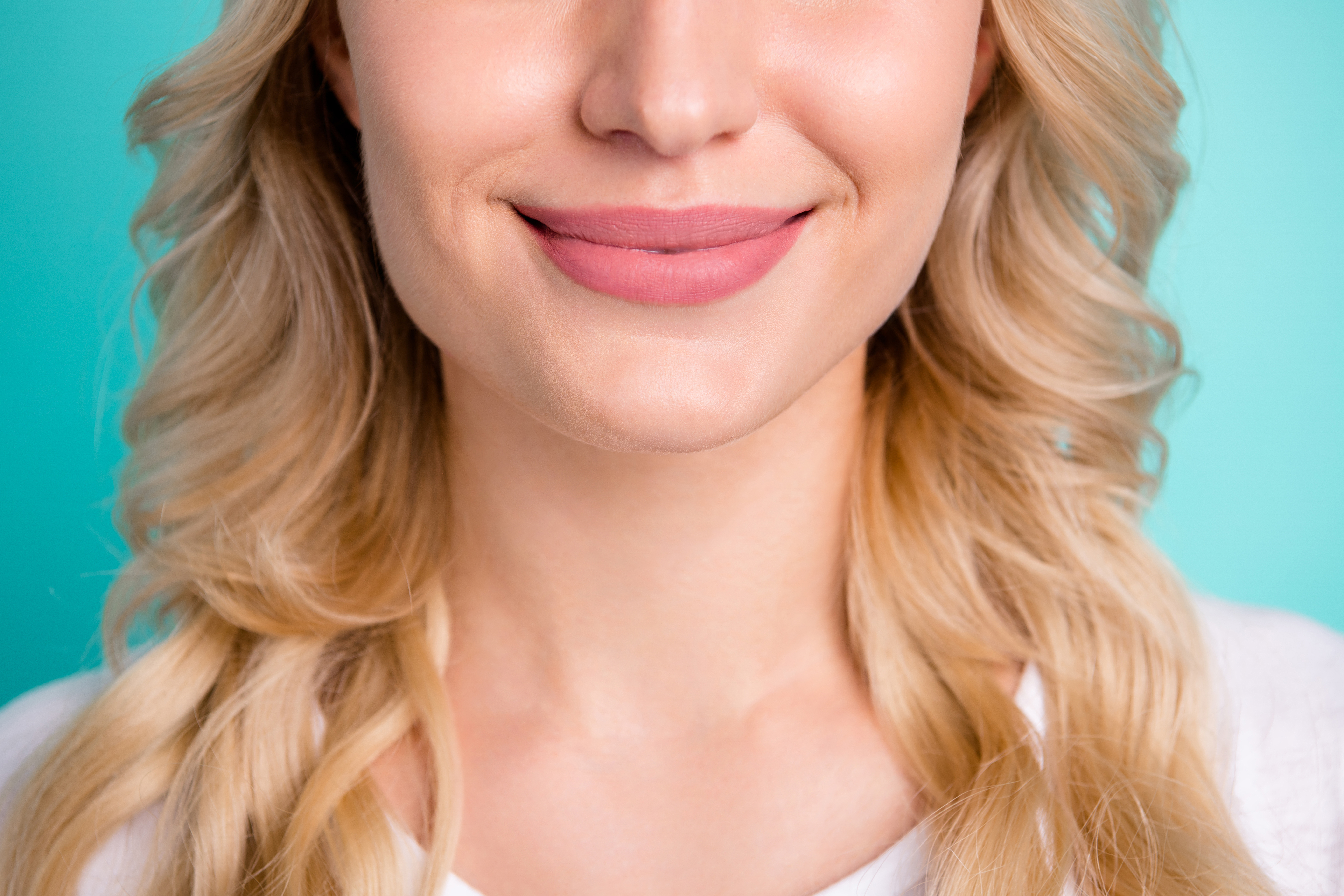 Woman's full lips after JUVÉDERM® ULTRA XC treatment