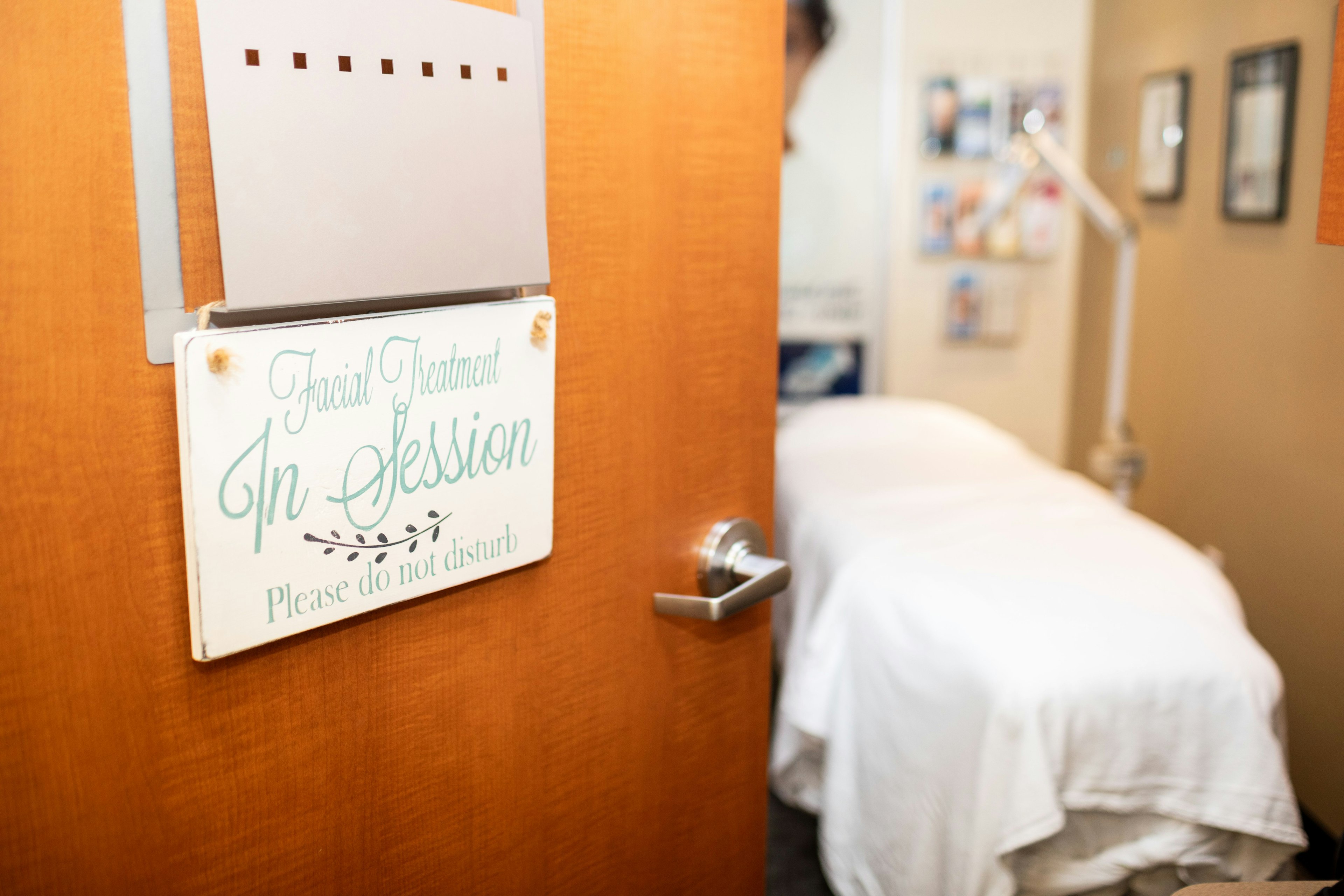 Full Spectrum Dermatology with a sign of "Facial Treatment in Session - Please do not Disturb"