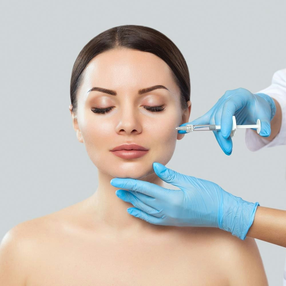 Woman with clear skin who received dermal fillers