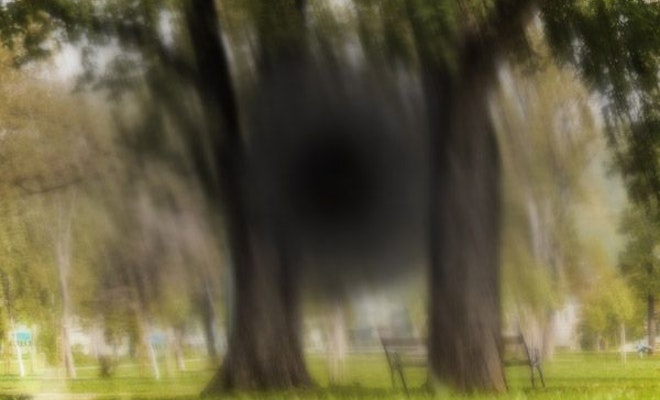 blurry vision with dark spot in the center