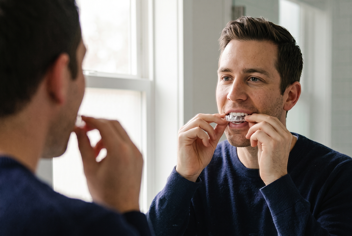 man using invisalign