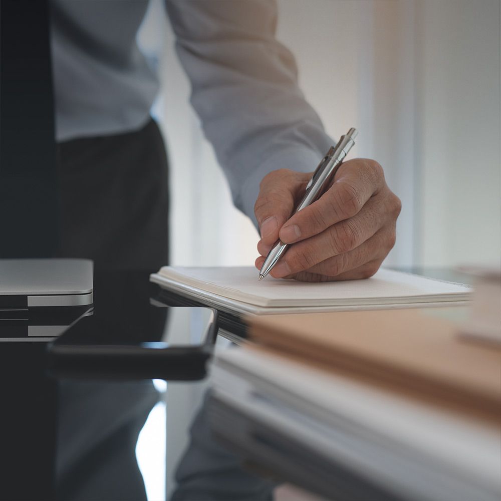Man completing paperwork