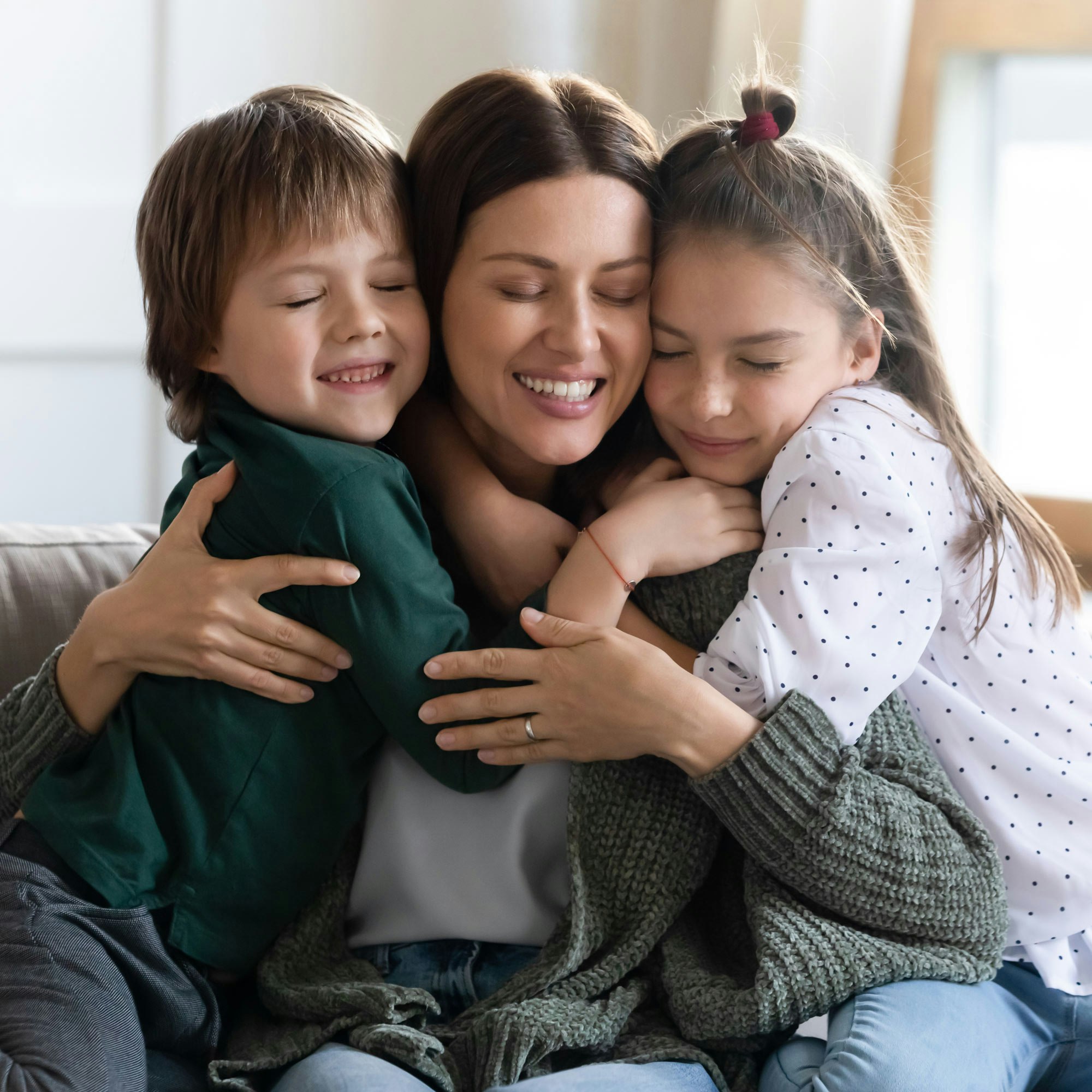 mom and children hugging