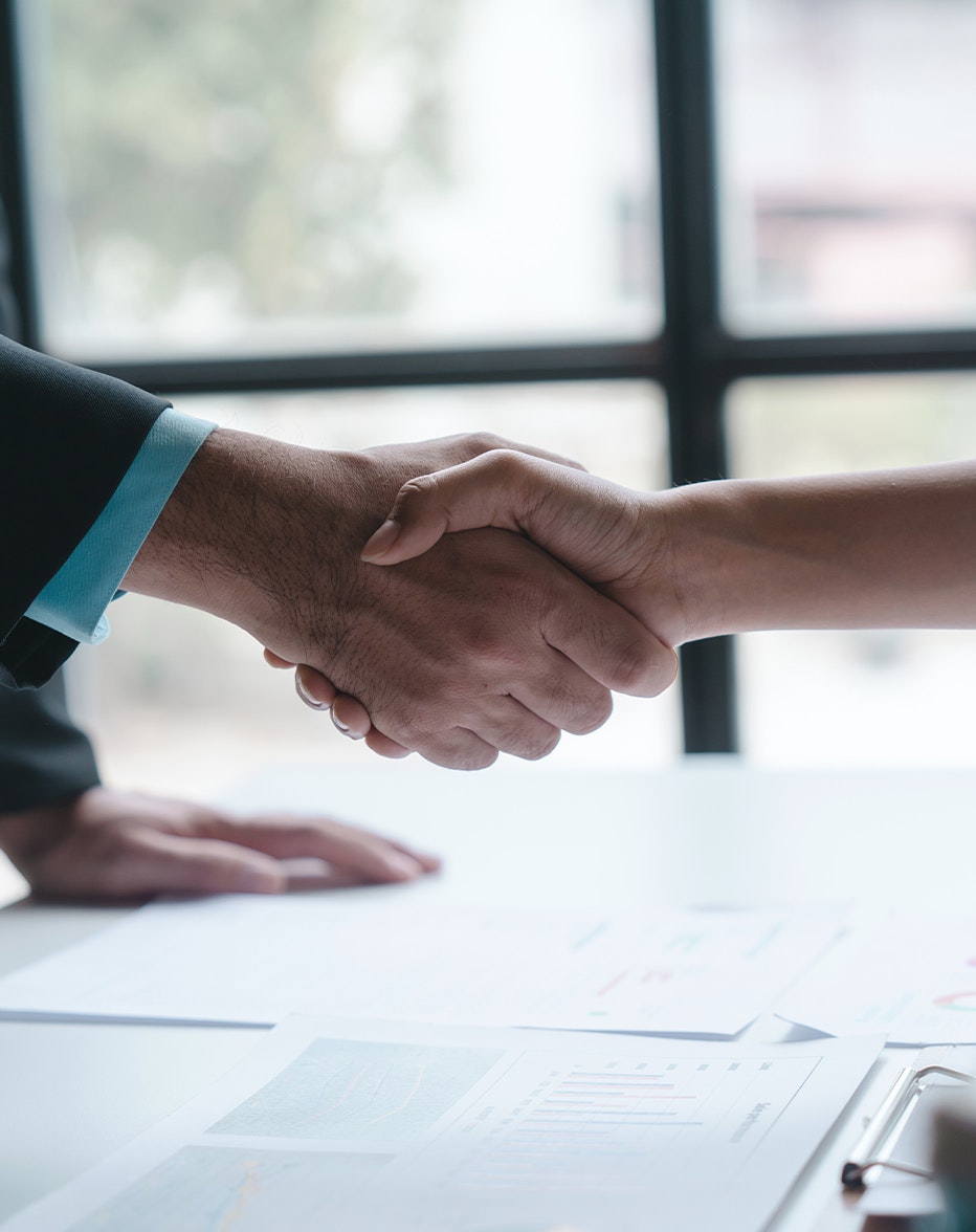 Man and woman shaking hands