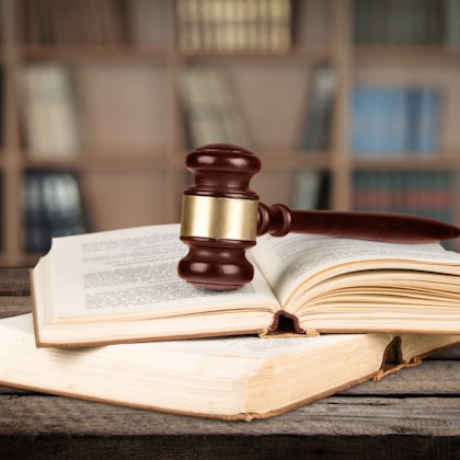 Man and woman sitting on couch together