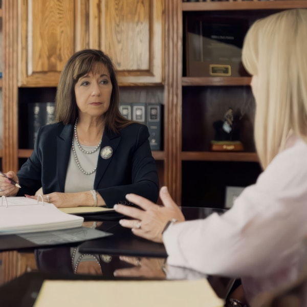 Debra Sutton meeting with one client