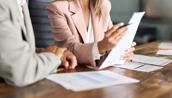 Woman looking over will