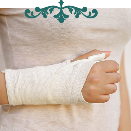 woman with bandaged hand and wrist