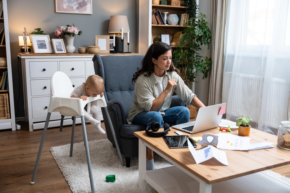 Divorced mother working on paperwork