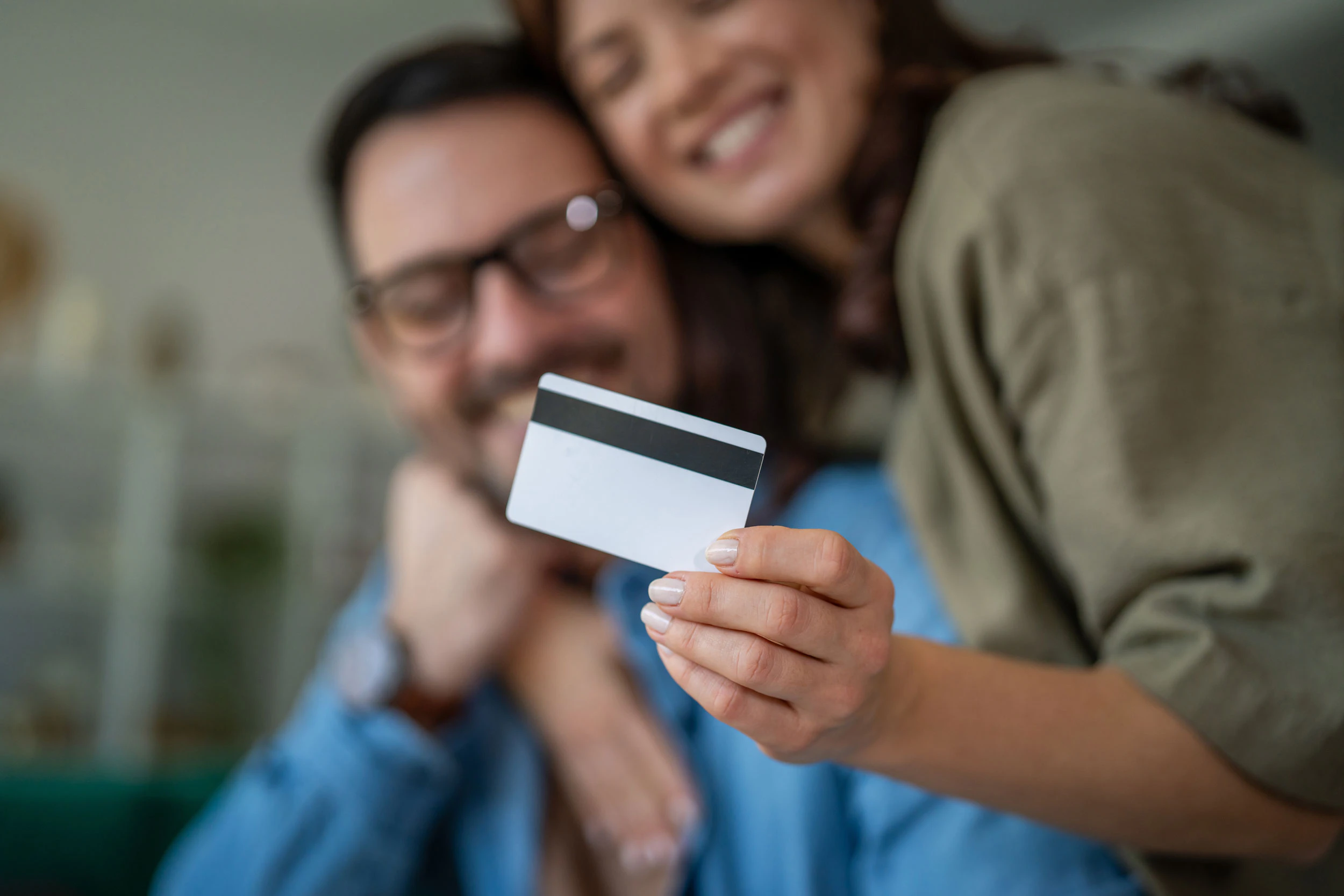 woman holding credit card