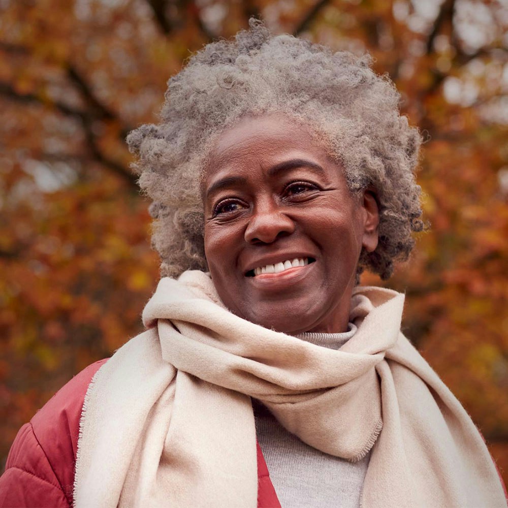 smiling woman in scarf