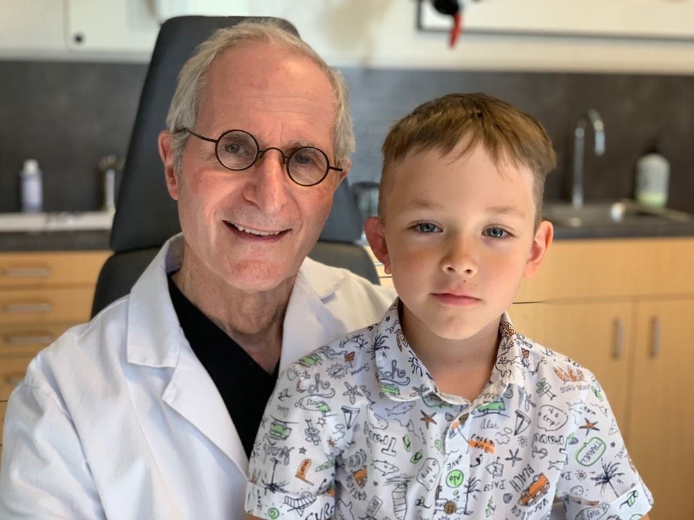 Dr. Reinisch with a patient