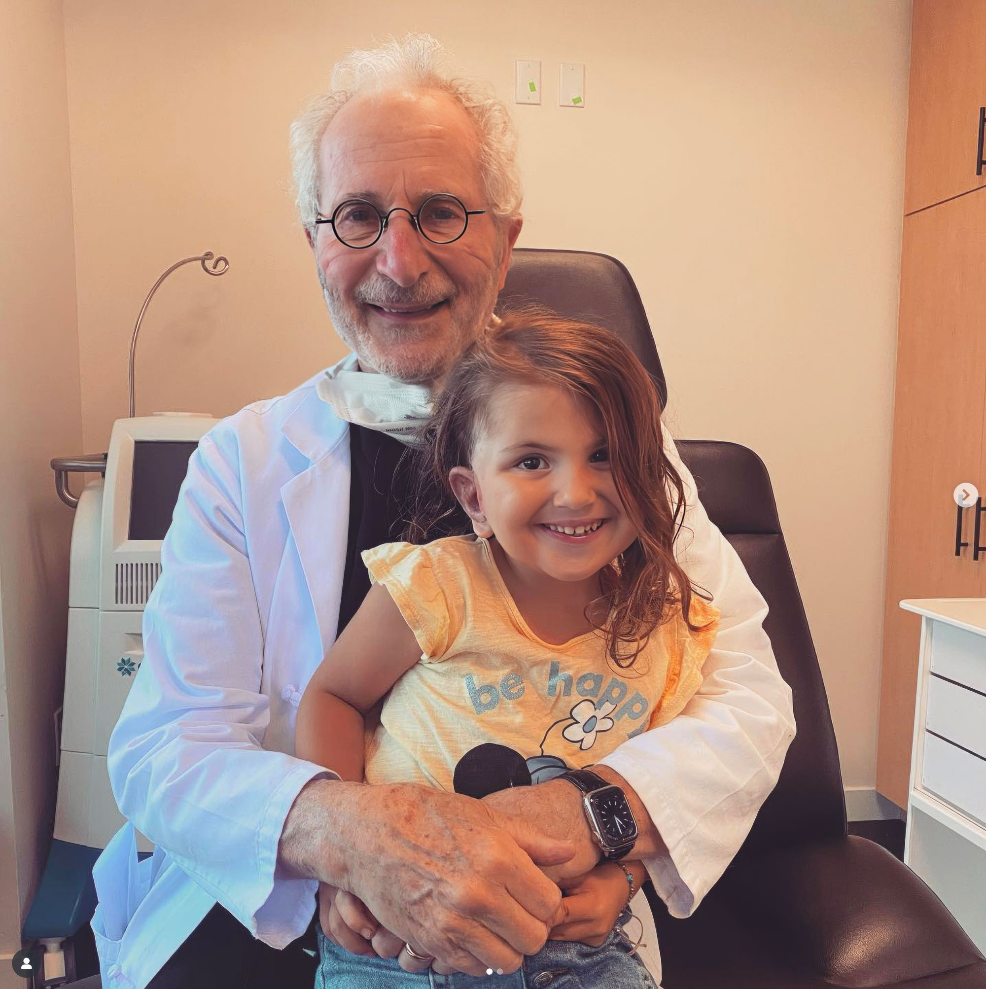 Dr. Reinisch with a pediatric patient